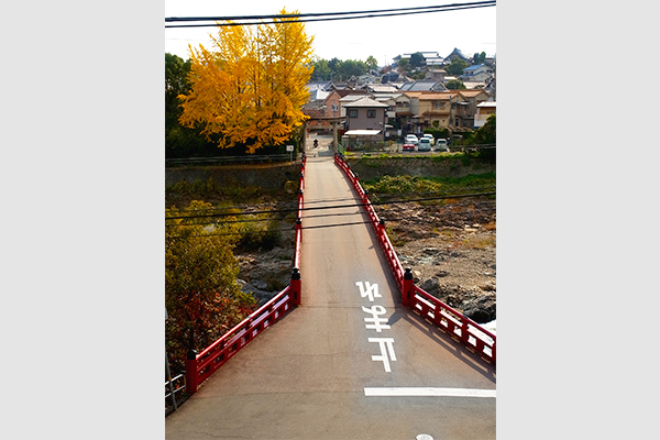 The sacred red bridge over Inagawa River